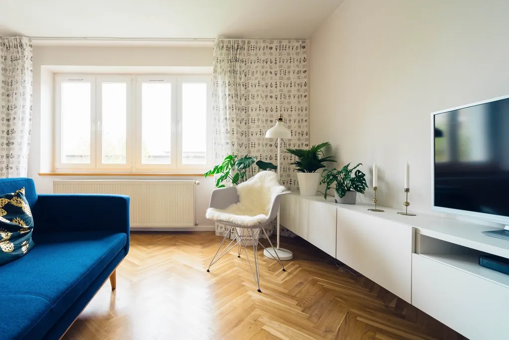 Bright Scandinavian living room with patterned curtains