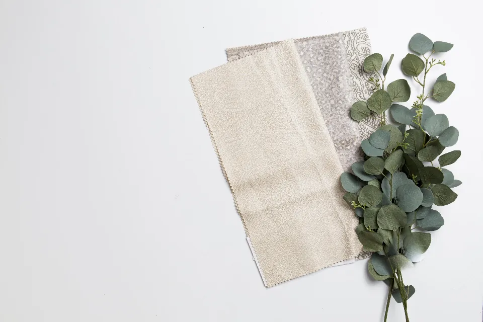 Linen swatches with eucalyptus